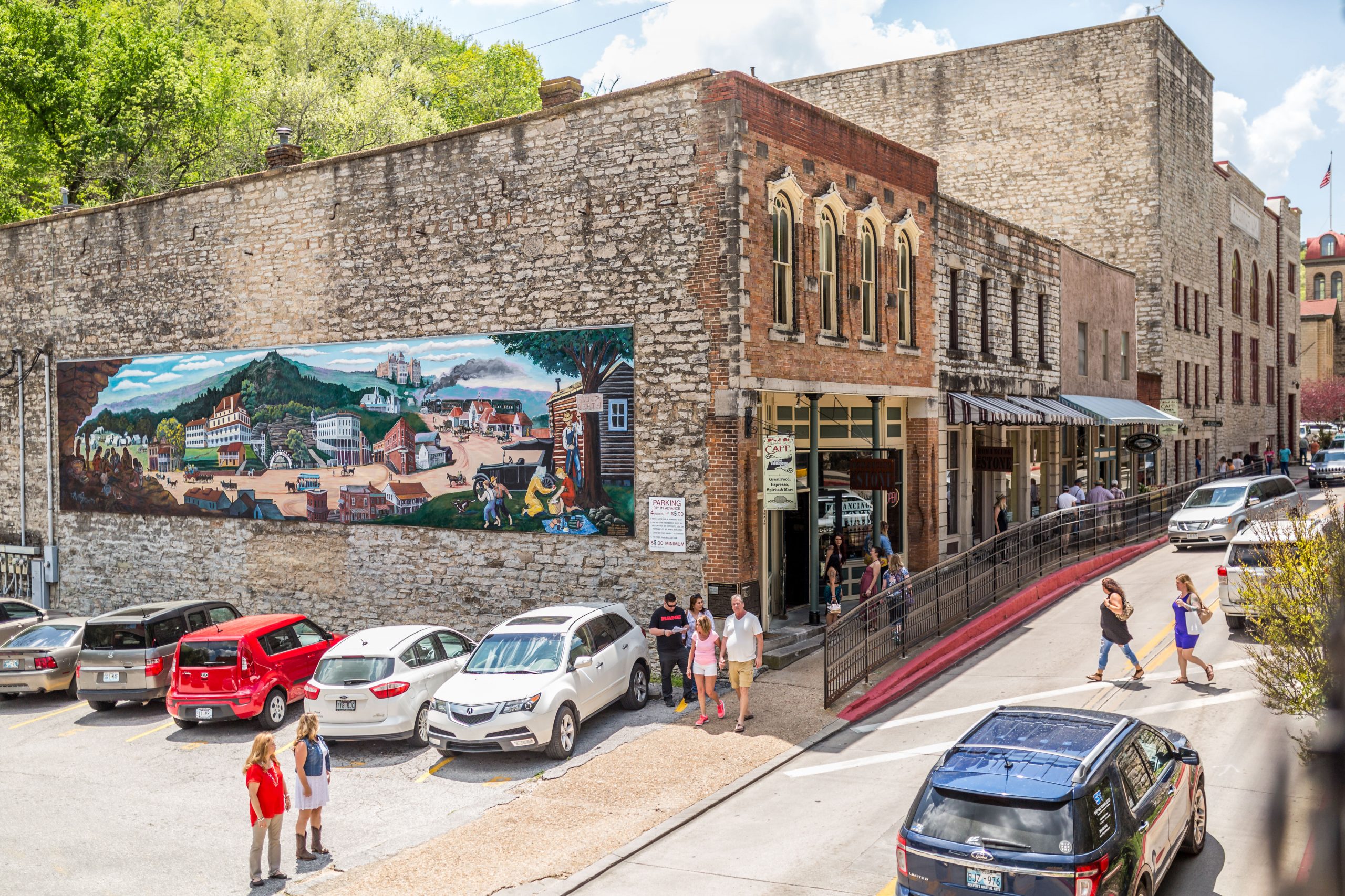 Visitors walk around Downtown Eureka Springs, and popular thing to do when visiting, the shops and dining.